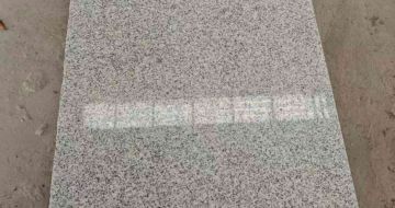 鸡西芝麻白光面毛板