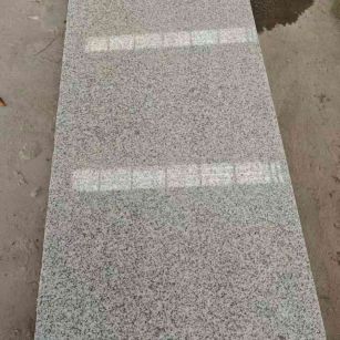 鸡西芝麻白光面毛板